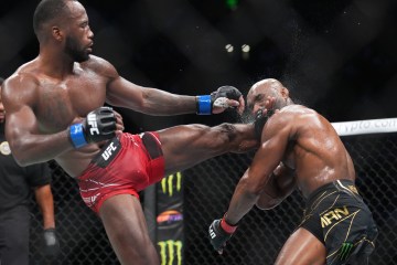 SALT LAKE CITY, UTAH - AUGUST 20: (L-R) Leon Edwards of Jamaica lands a head kick to Kamaru Usman of Nigeria in the UFC welterweight championship fight during the UFC 278 event at Vivint Arena on August 20, 2022 in Salt Lake City, Utah. (Photo by Chris Unger/Zuffa LLC)